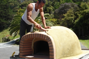 Rob puts finishing touches on a Calabrian oven