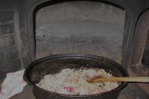 Saute the onions and garlic in heated oil for a minute, then add the rice and toast it