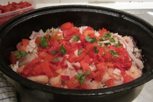 put all the ingredients (uncooked )on top of the rice, once wine has reduced by half