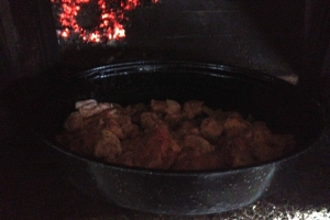 Saute onions, garlic, bacon in wood fired oven